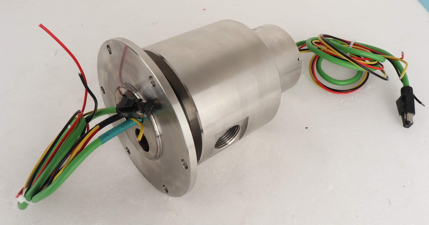 JARCH integrated electrical and fluid slip ring with hose ports and electric lead wires